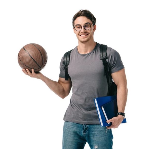 smiling handsome student holding basketball ball, basketball scholarships for college