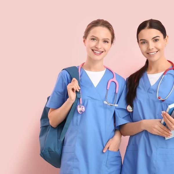 female medical students carrying books, bag and stethoscopes